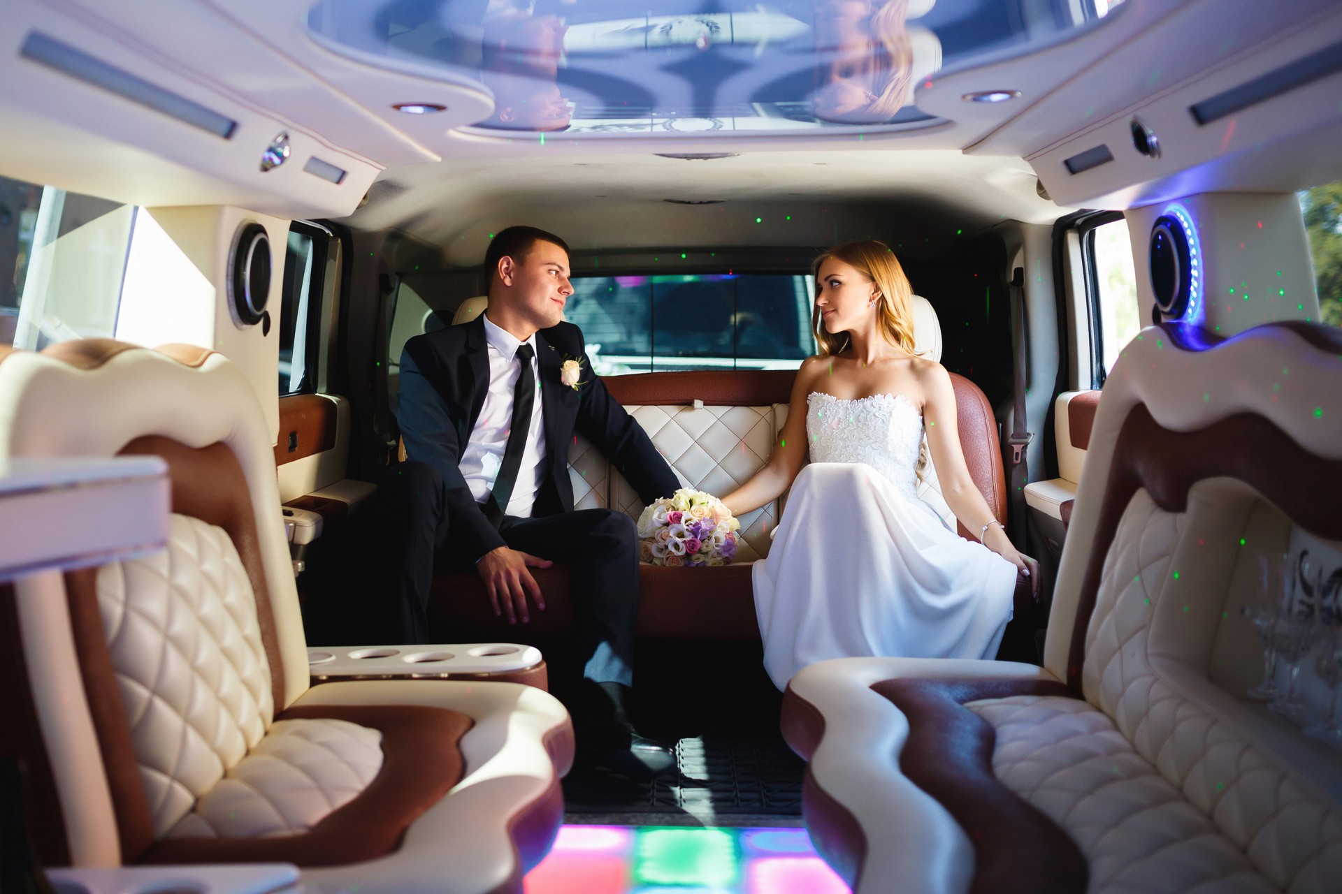 Newlyweds in a car