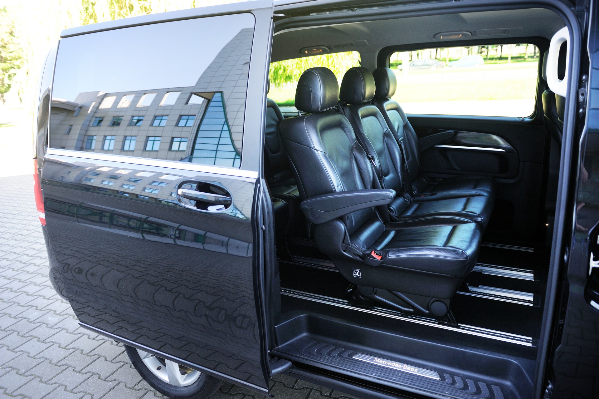 Mercedes-Benz V-class, front view. Photographing a modern car in the parking lot.